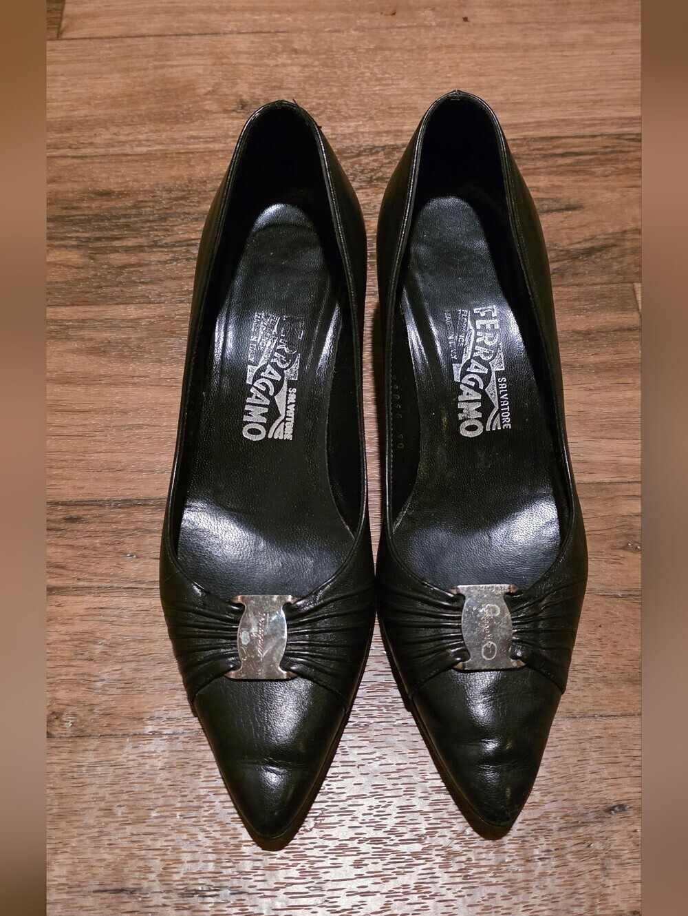 Salvatore Ferragamo Black Pointed Leather Pumps with Silver Tone Logo Accent